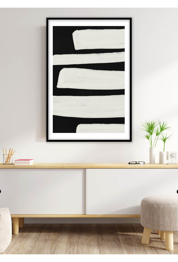 Abstract minimalistic style print with white chunky linear brushstrokes on a black solid background.