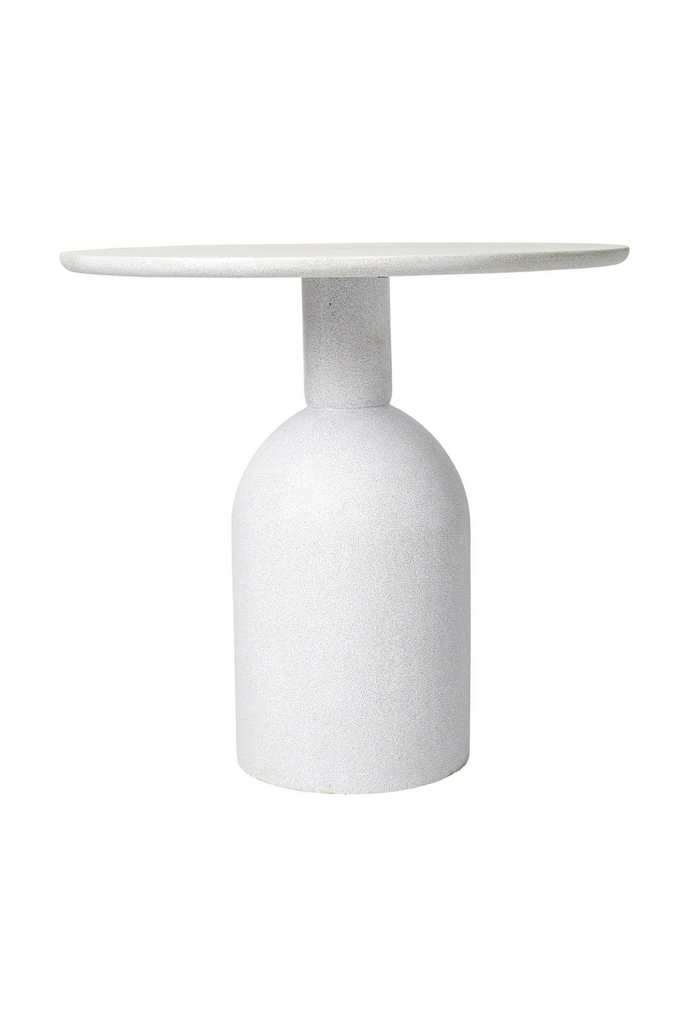 Small versatile side table with round table top and solid round pillar base in a white powder-stone finish