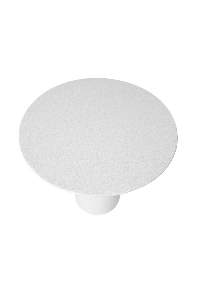 Small versatile side table with round table top and solid round pillar base in a white powder-stone finish