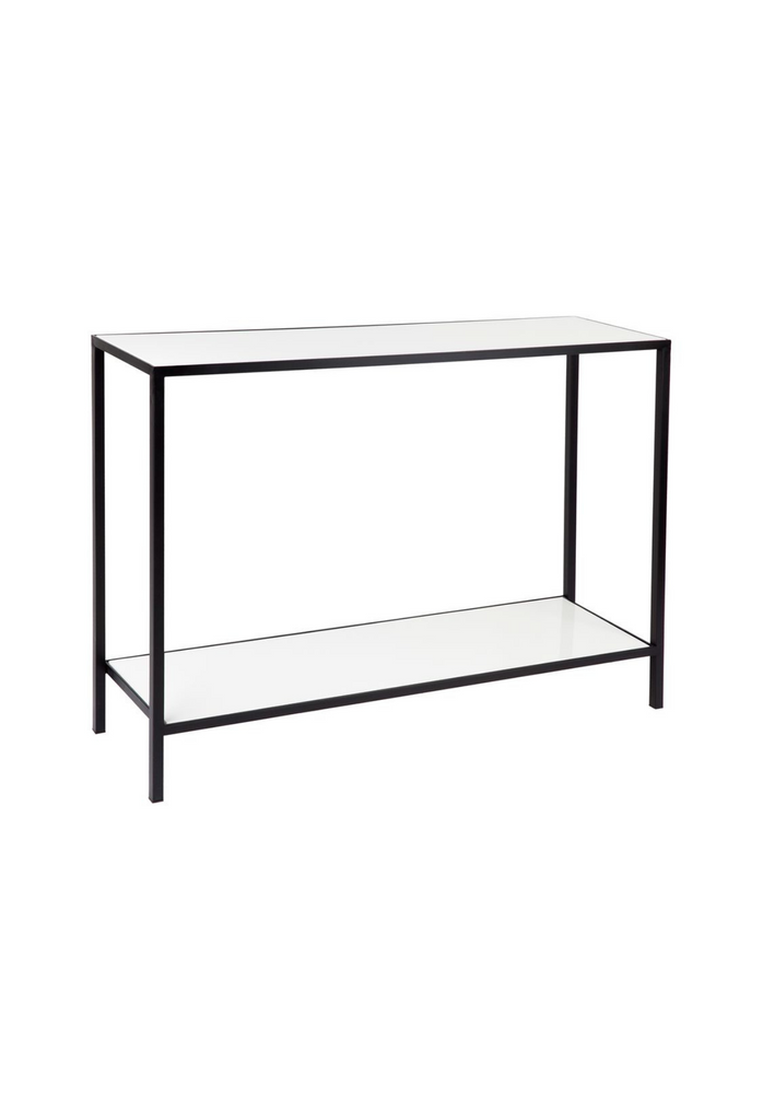 Two tier rectangular console with black metal frame and white stone table top and shelf on white background