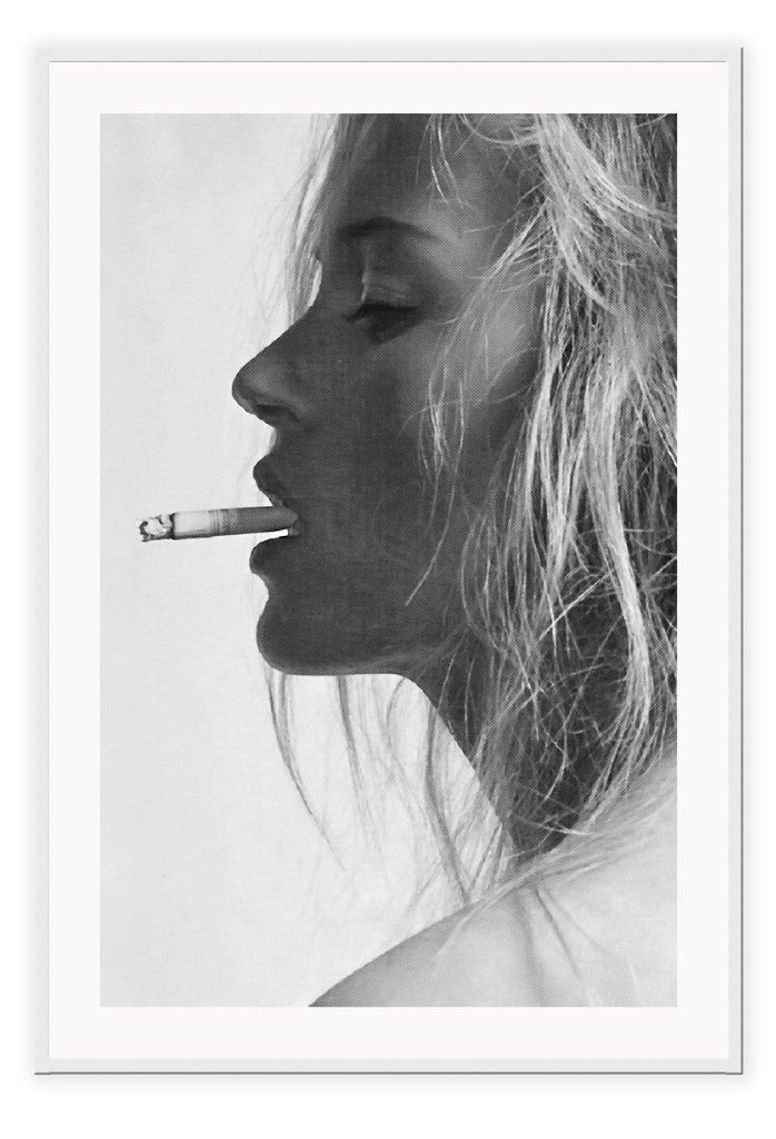 A black and white fashion  photographic wall art with iconic 90s model Kate Moss smoking cigarette. 