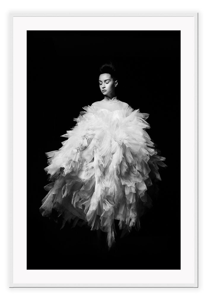 Fashion print with woman in white dress floating on a black background  