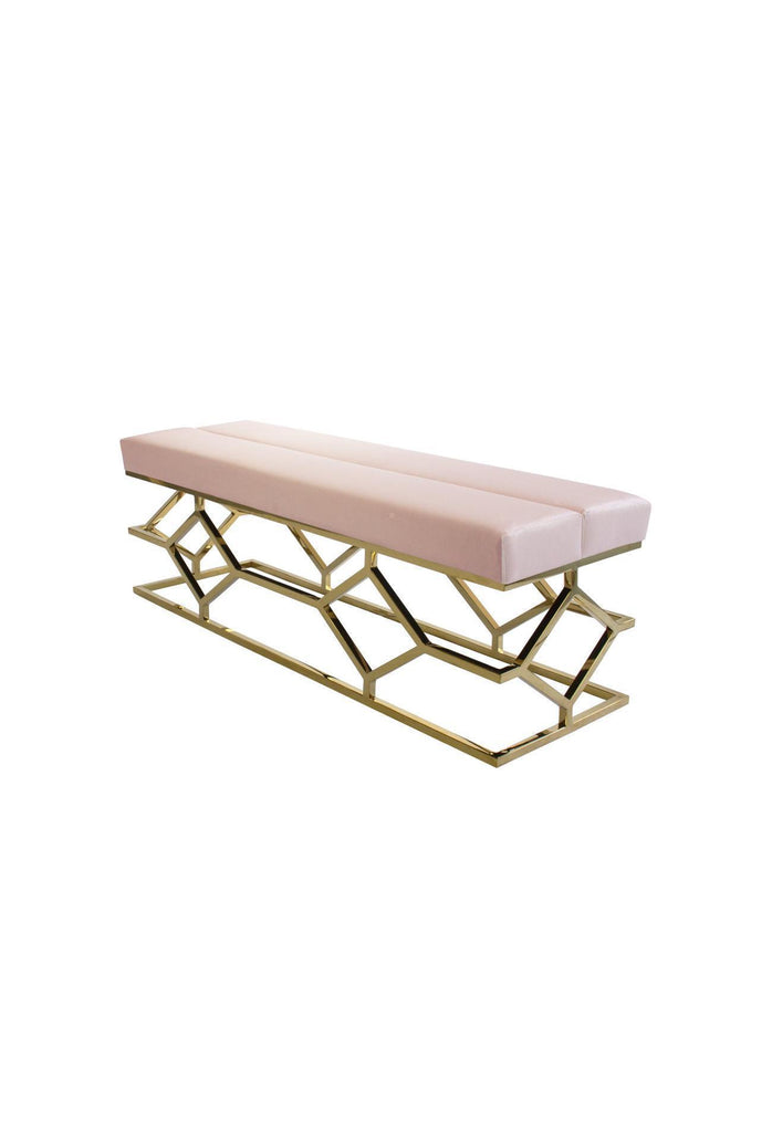 Bench Ottoman with a rose blush velvet seat and a gold steel base in geometric shapes on a white background