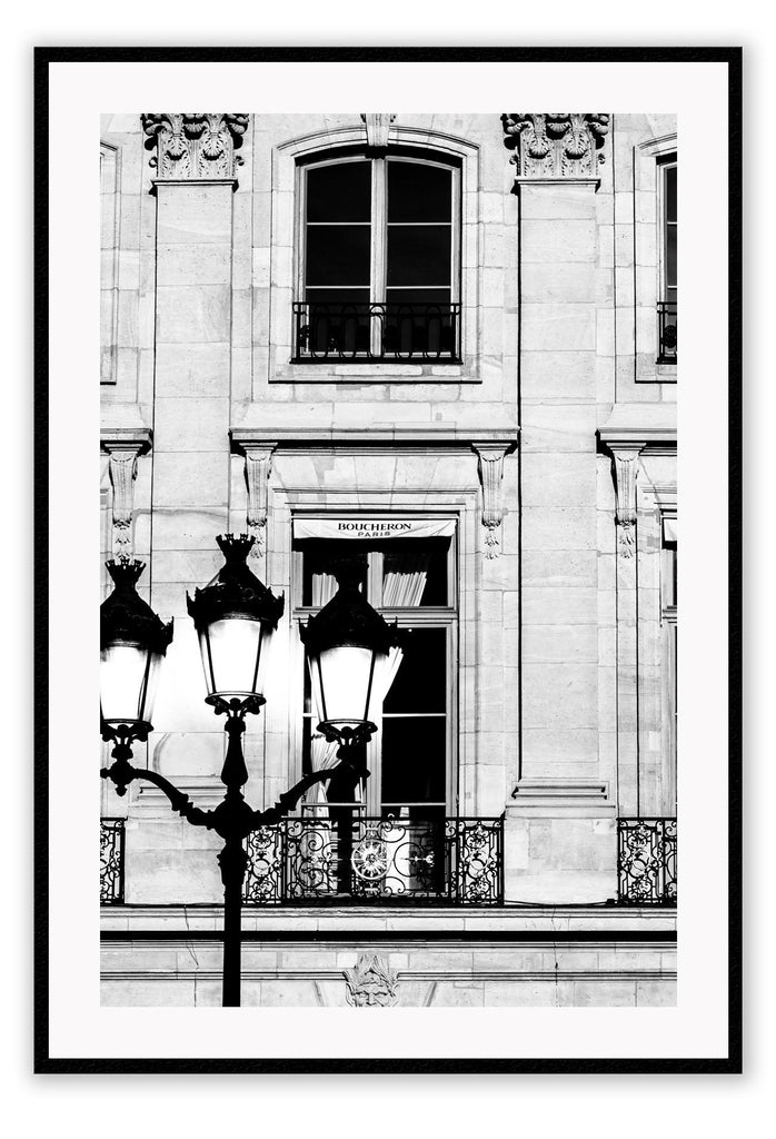 A black and white fashion photography print in paris with street lamp and architechture 