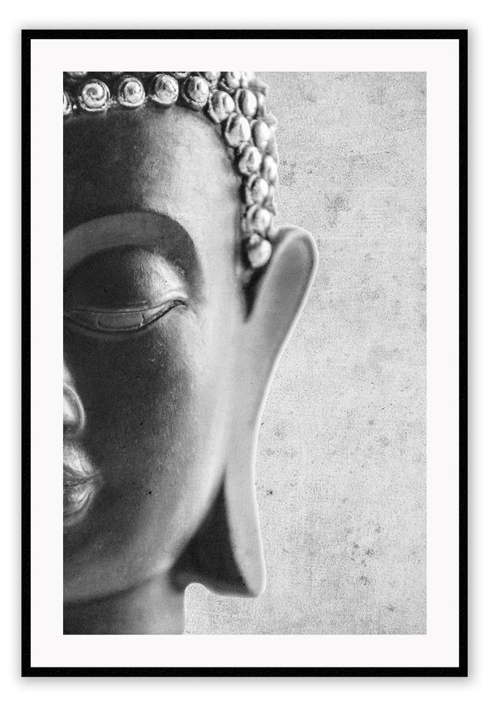 Photography print of black and white buddha half of face with textured grey background