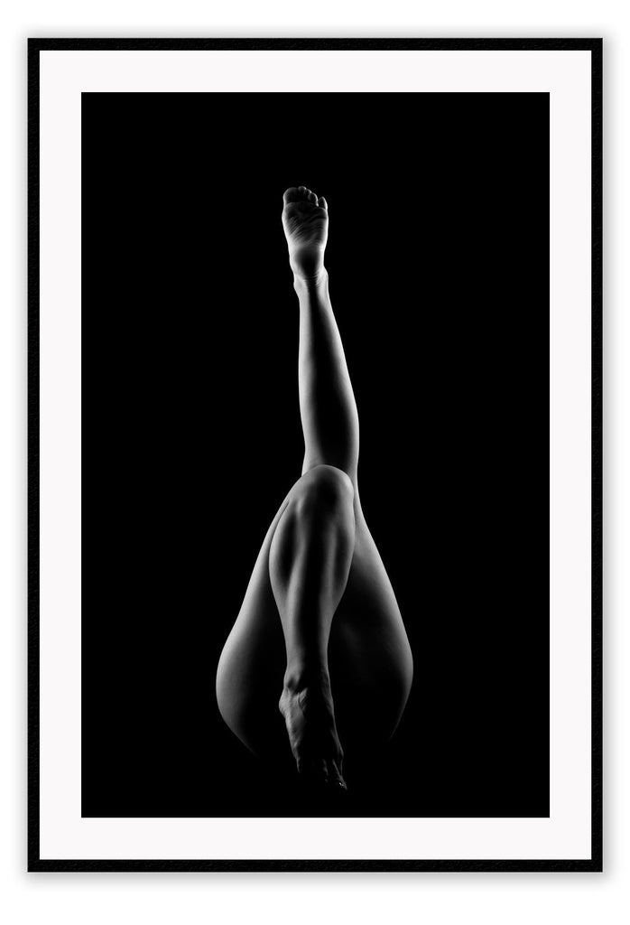 A black and white fashion wall art with dancing legs of a ballerina