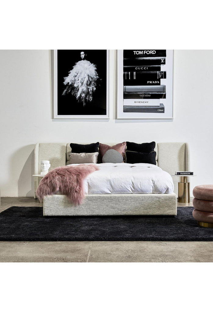 Modern Bed fully upholstered in textured grey fabric with a padded head board featuring generous wings extending out to the side