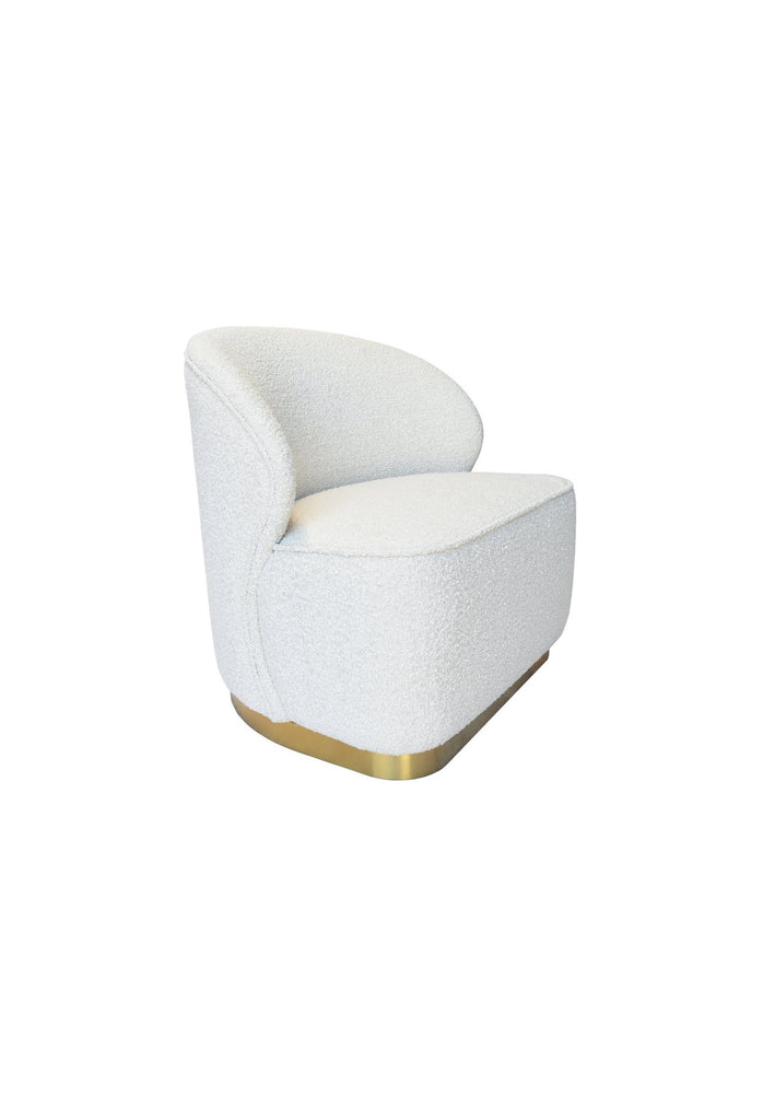 Chunky armless chair with curved back rest fully upholstered in ivory white boucle with a solid brushed gold metal base