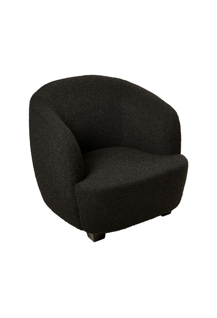 Modern curved tub style armchair upholstered in black charcoal boucle with black feet on a white background