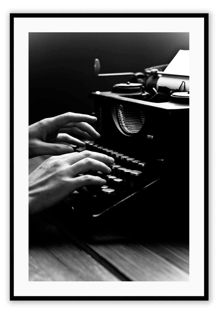 A vintage black and white wall art of a vintage type writer. 