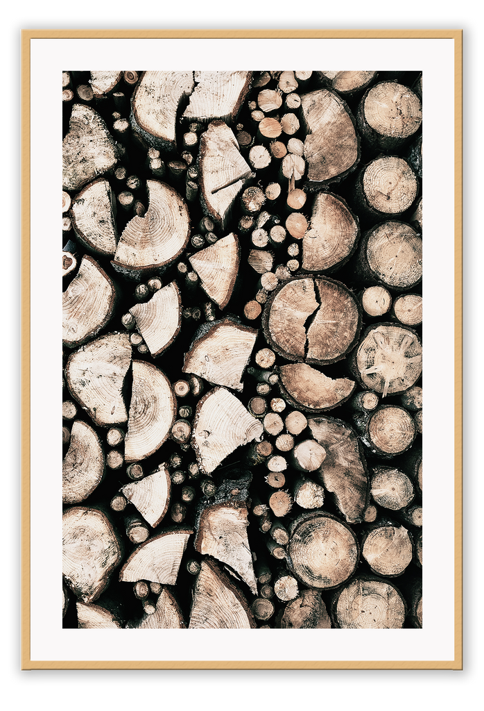 Natural print with small and large cut pieces of wood on a black background 