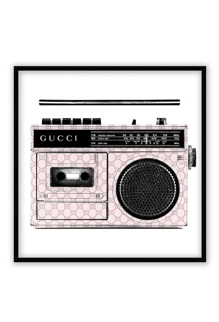 Fashion print with Gucci branded boombox and monogramming in pink with a white background. 