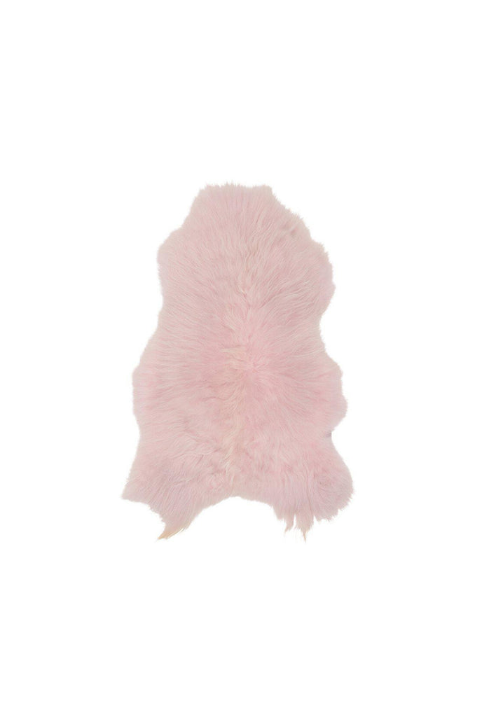 Natural Icelandic Sheepskin Rug Throw in its Organic Shape with Long Hair in Dusty Pink on white Background