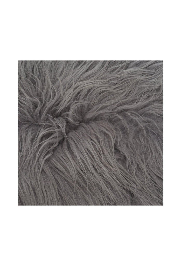 Natural Icelandic Sheepskin Rug Throw in its Organic Shape with Long Hair in Dyed Grey on white Background