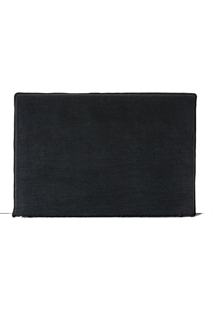 Minimalistic Bedhead with soft edges upholstered in 100% black linen with a simple self-edged border