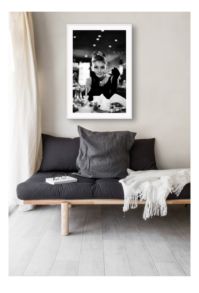 A vintage fashion, cinematic wall art of model Audrey Hepburn in 60s movie Breakfast at Tiffanys