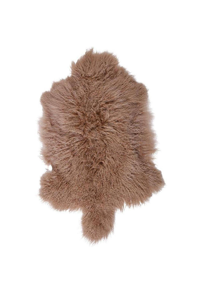 Mongolian Sheepskin in its natural shape and with its unique long hair in camel on white background
