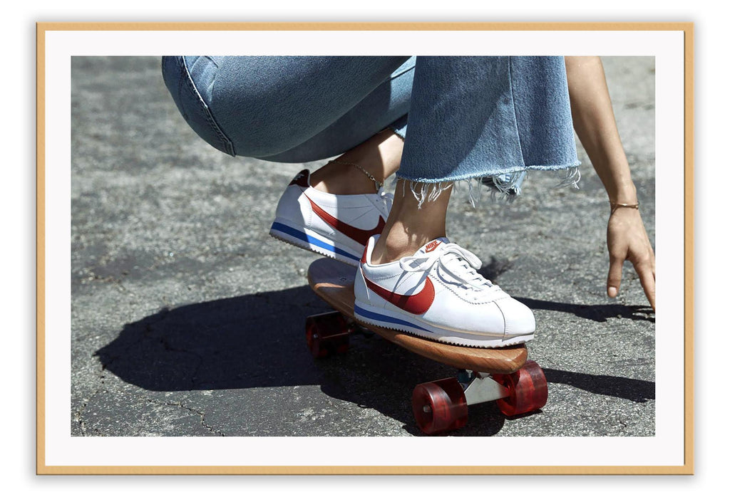 Landscape print with nike cortez sneakers on penny board skating jeans blue red grey denim 
