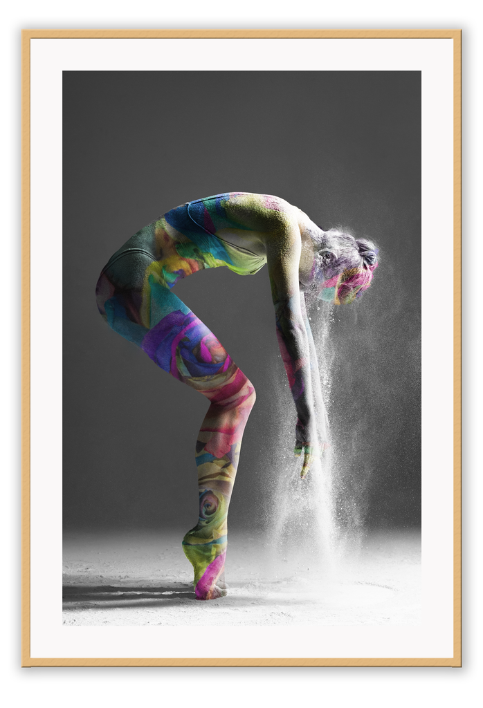 Fashion dance print with black and white background sexy woman rising from dust and body coloured with multi-coloured swirls. 