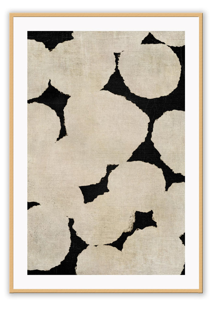 Abstract print with cream round shapes on a black background with watercolour texture. 