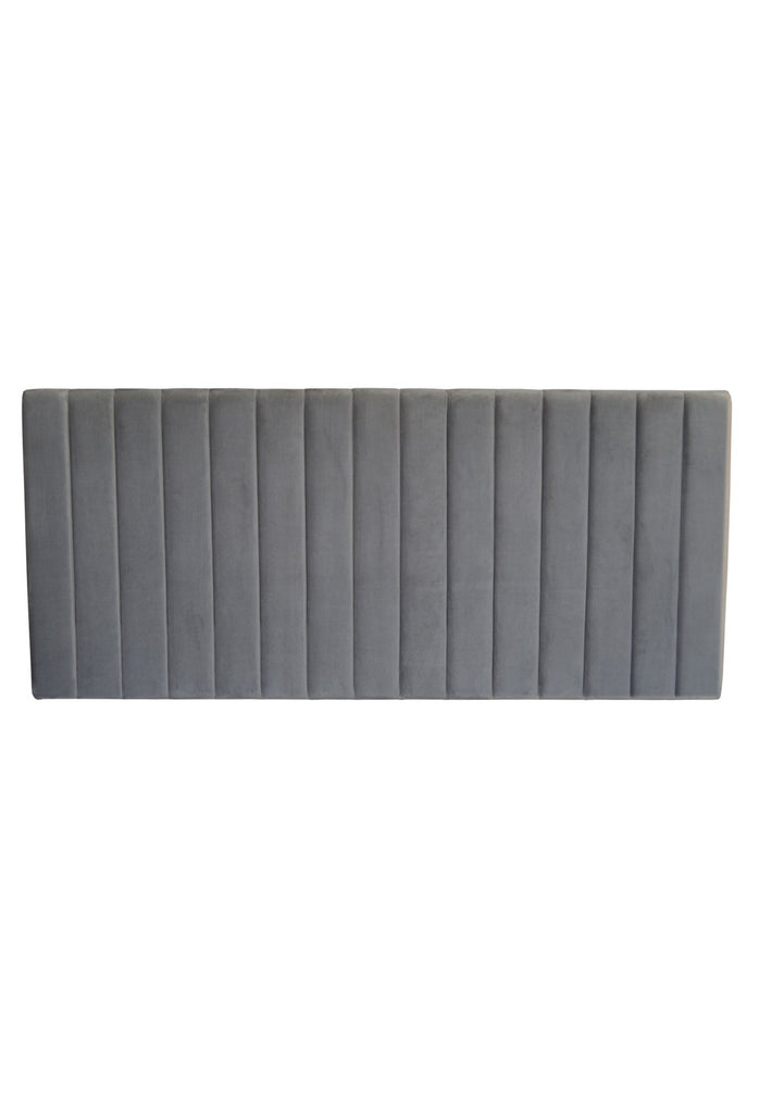 Minimalistic rectangular panelled and padded bedhead fully upholstered in dark grey velvet on a white background