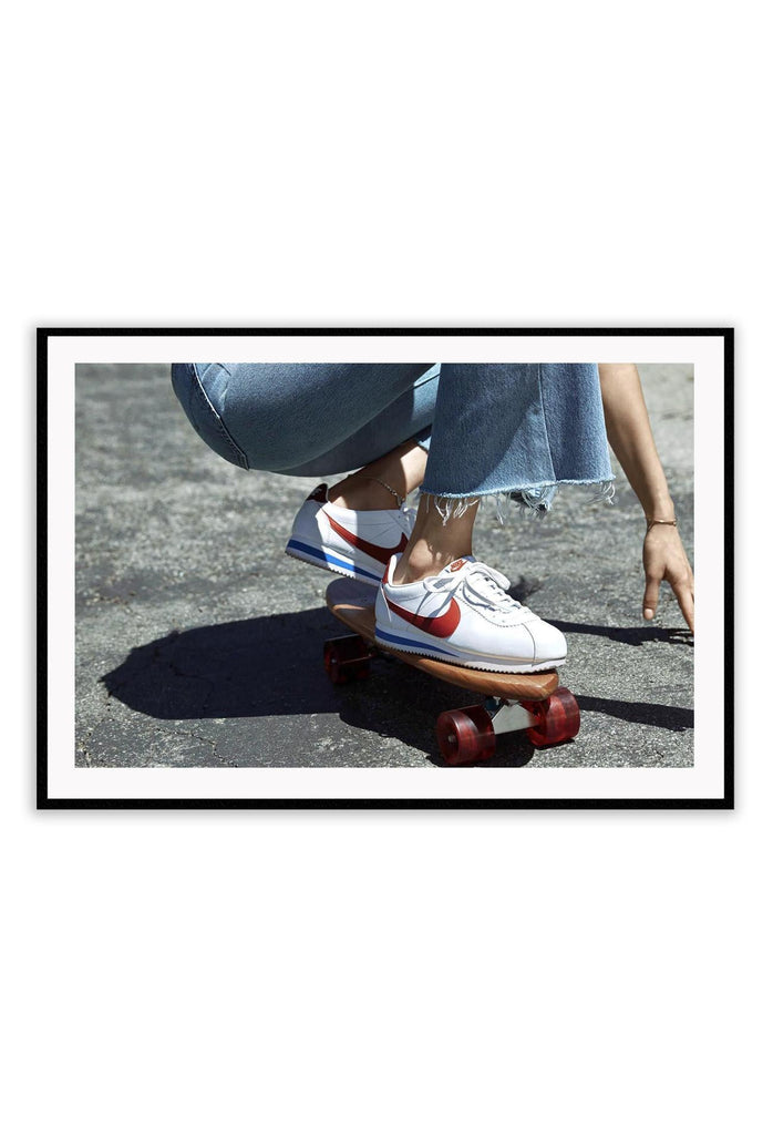 Landscape print with nike cortez sneakers on penny board skating jeans blue red grey denim 