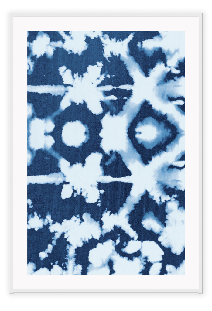 Tie dye print with blue and white detail forming organic pattern with coastal ocean style. 