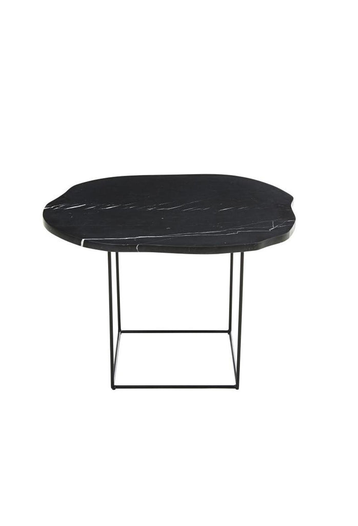 Side Table with black marble top in organic round shape and a black metal frame on a white background