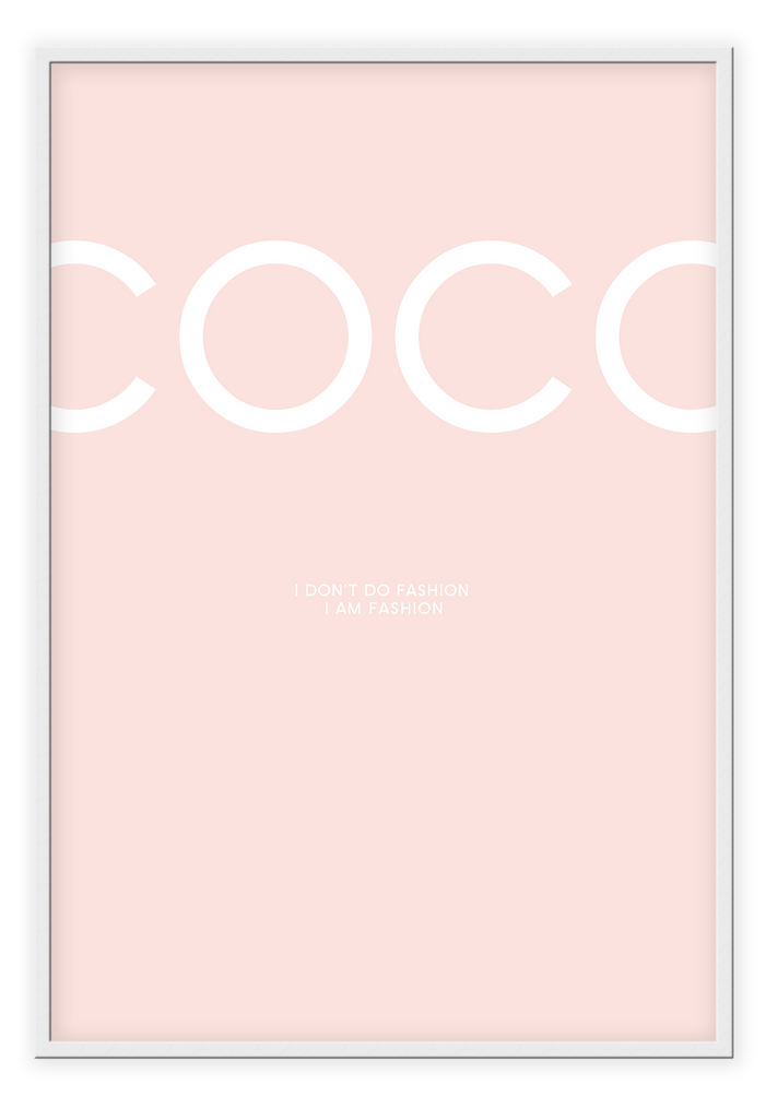 A fashion typography wall art with coco chanel I dont do fashion I am fashion white writing on pink background. 