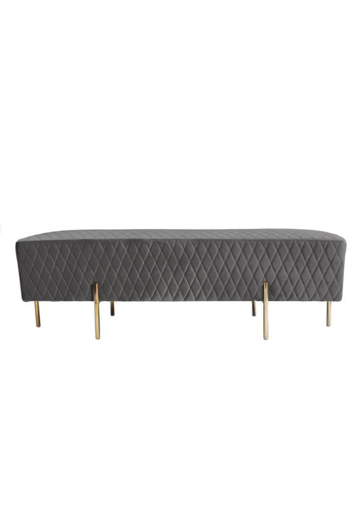 Minimalistic Bench Ottoman Upholstered in Dark Grey Velvet with Six Thin Gold Finish Steel Legs on a White Background