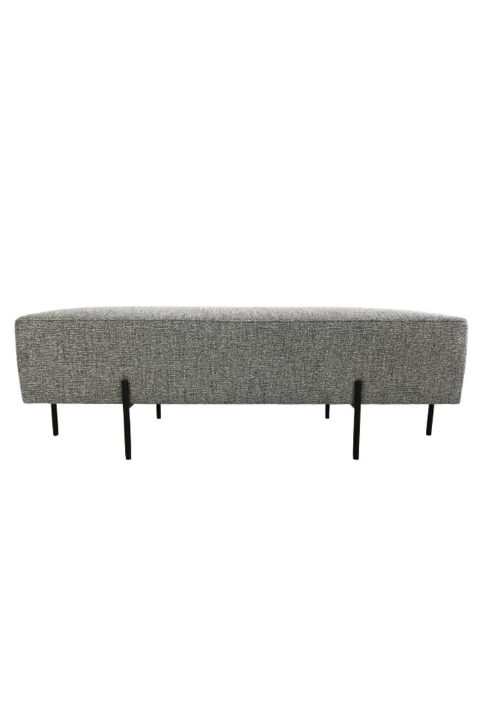 Minimalistic Bench Ottoman Upholstered in a Textured Black and White Fabric with Six Thin Black Steel Legs on a White Background