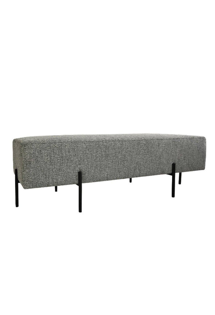 Minimalistic Bench Ottoman Upholstered in a Textured Black and White Fabric with Six Thin Black Steel Legs on a White Background