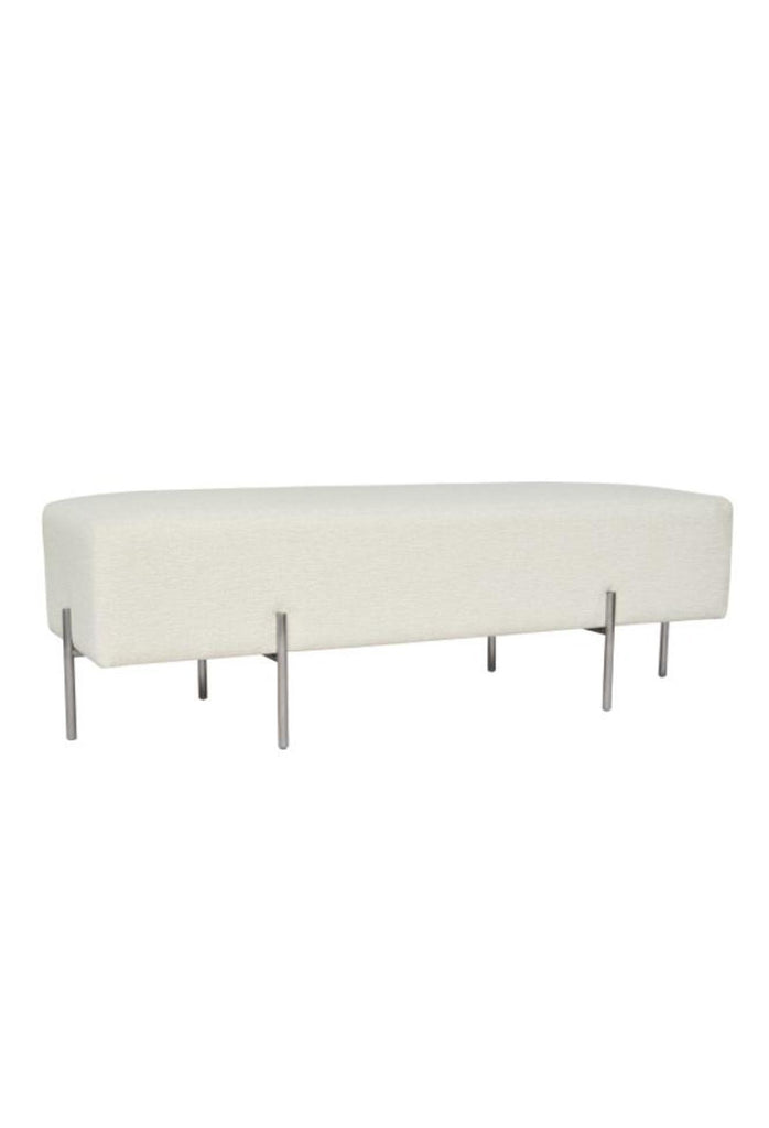 Minimalistic Bench Ottoman Upholstered in a Textured Pearl White Fabric with Six Thin Silver Steel Legs on a White Background