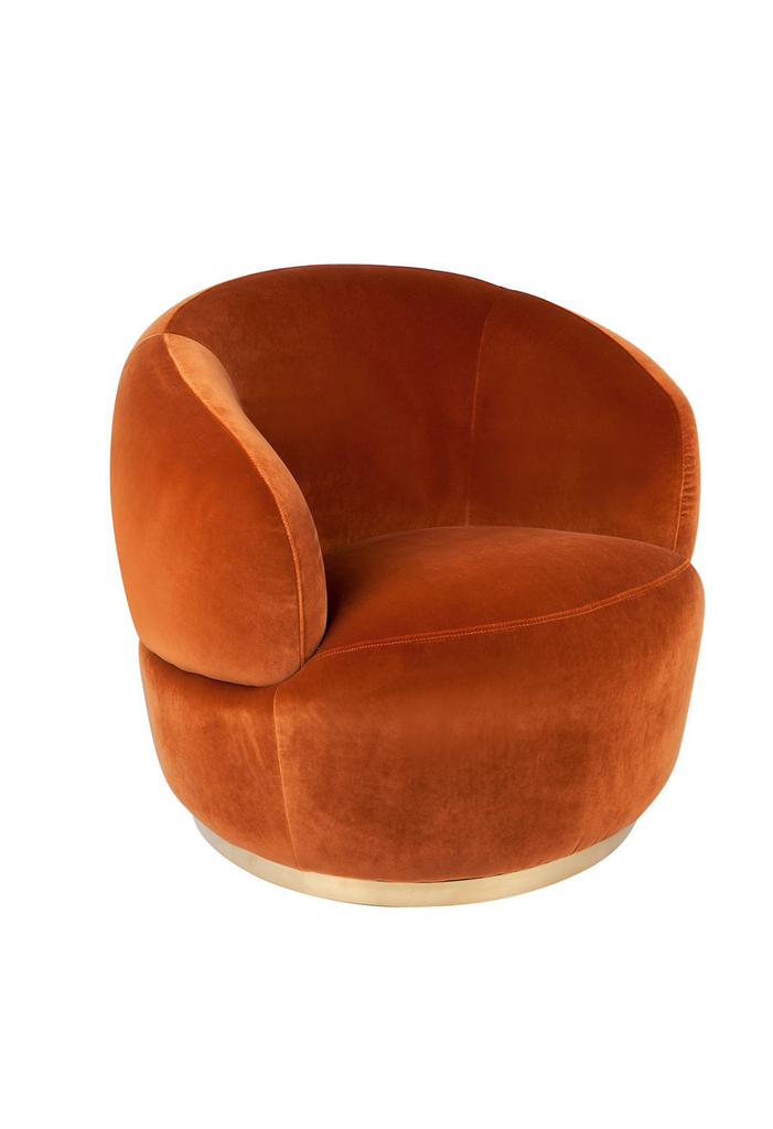 Caramel Velvet Swivel Armchair with a chunky curved back rest and a gold base fully upholstered in caramel orange velvet