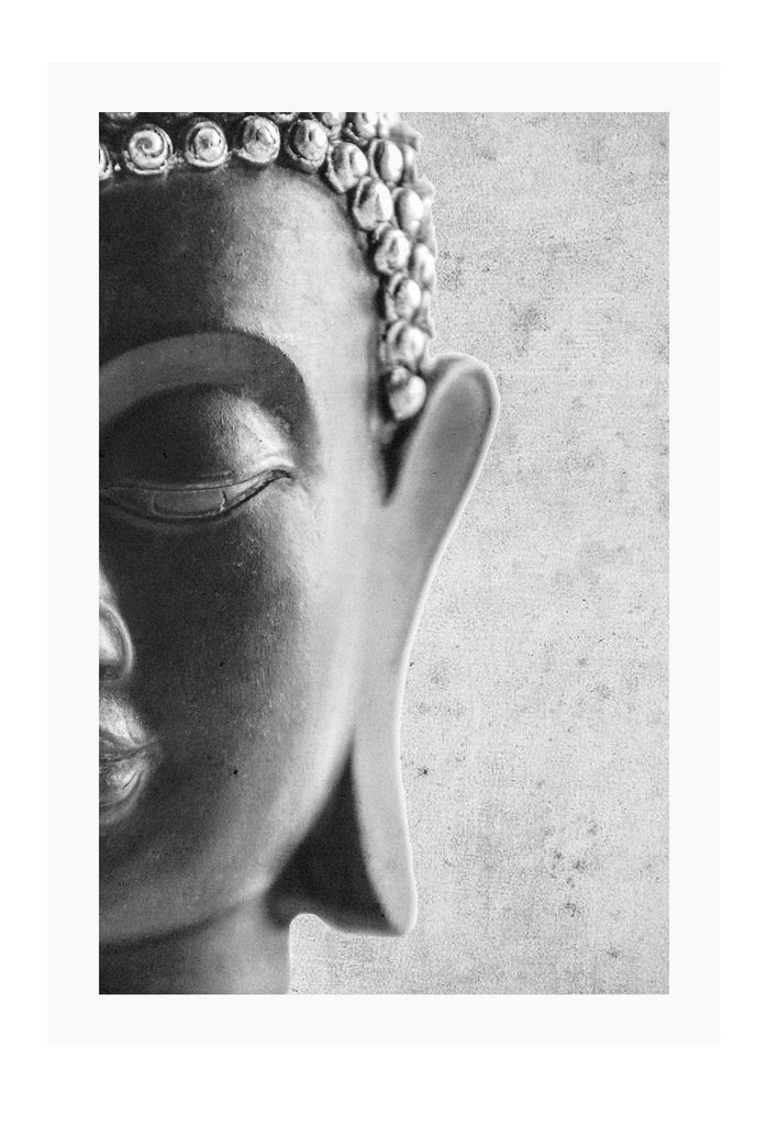 Photography print of black and white buddha half of face with textured grey background