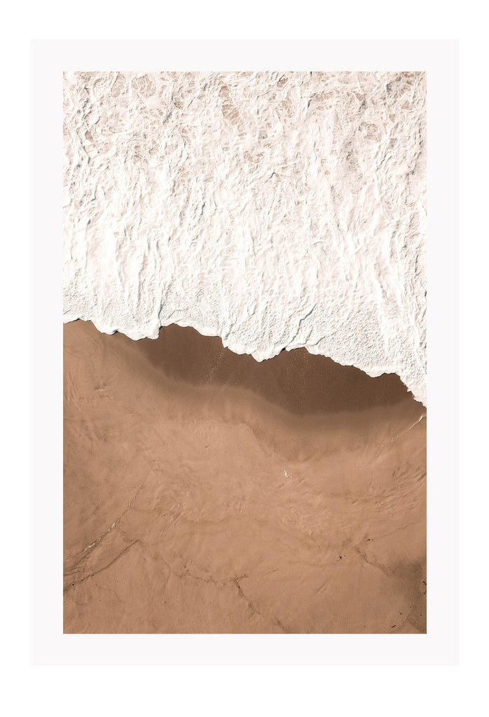 Beach with white wash waves portrait and tan sand with shadows space print 