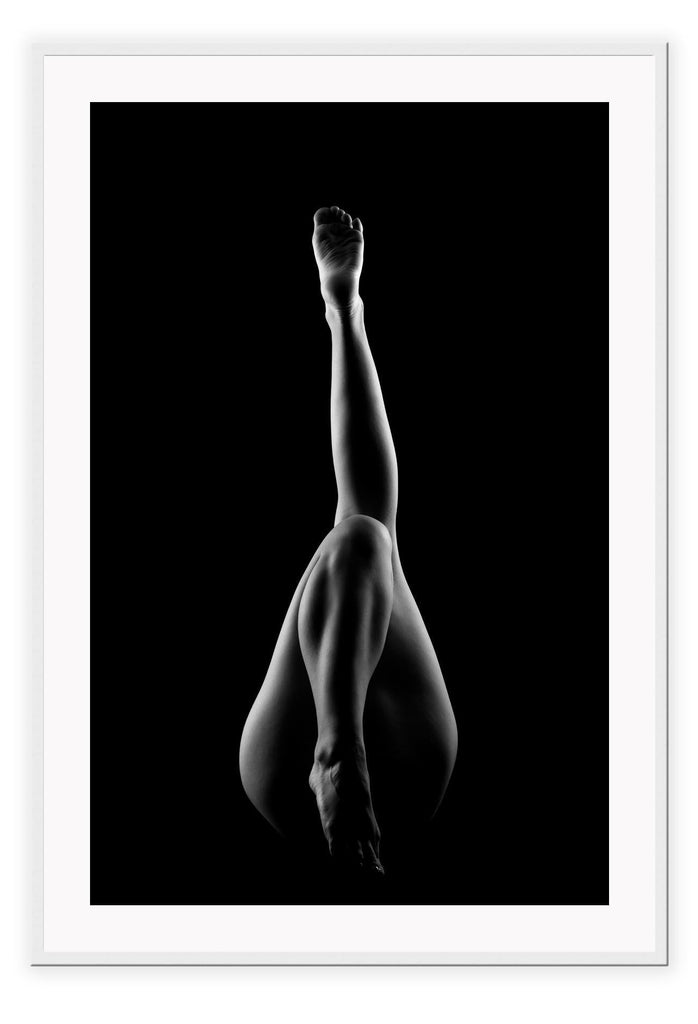 A black and white fashion wall art with dancing legs of a ballerina